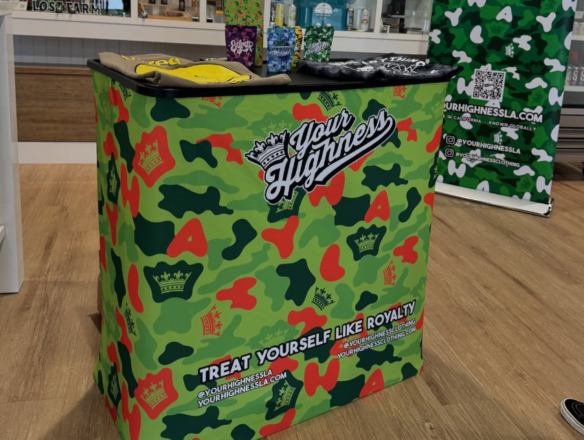 Custom case-to-podium counter for Your Highness with camouflage branding