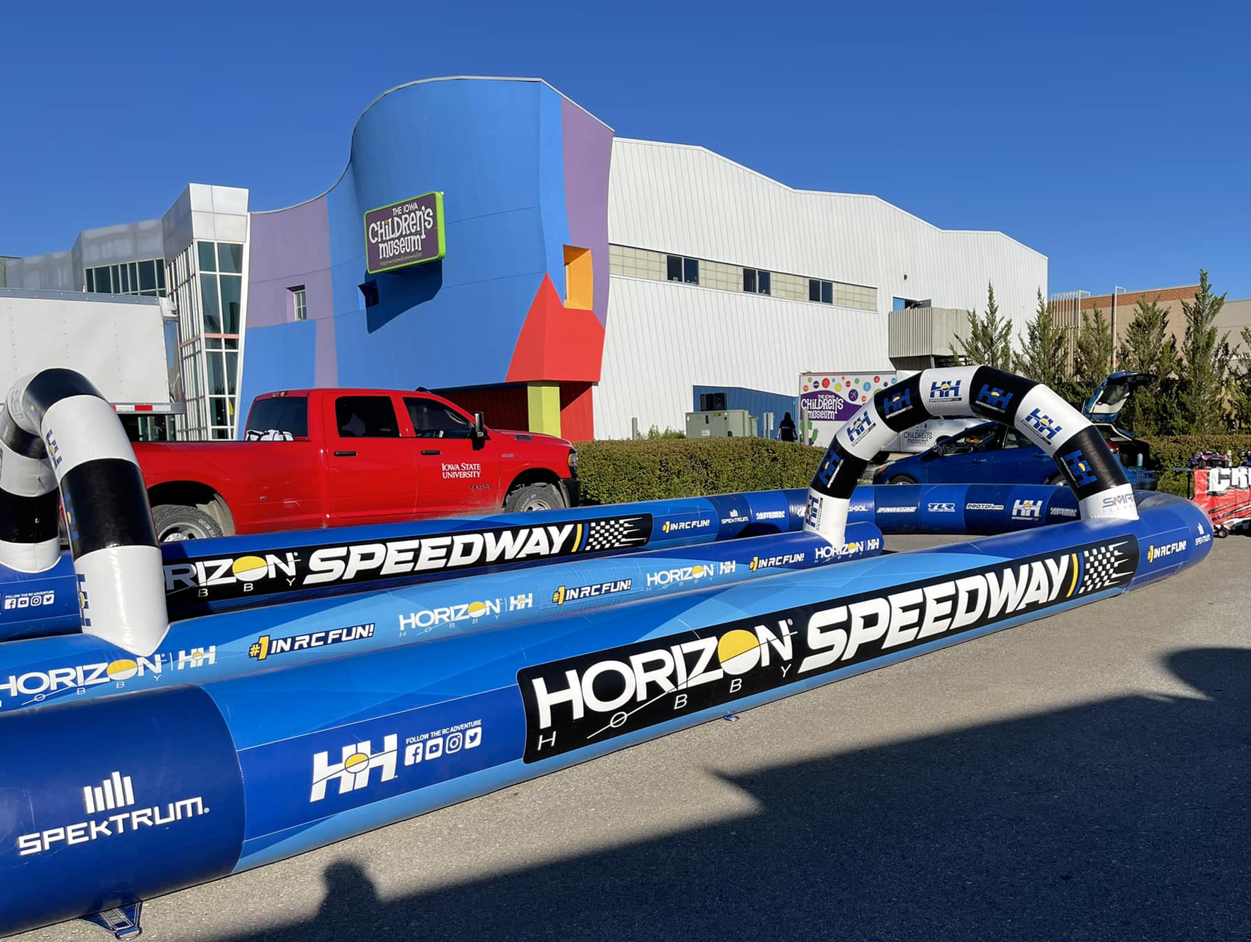 Custom inflatable race track used for museum and community activations with Horizon Hobby branding