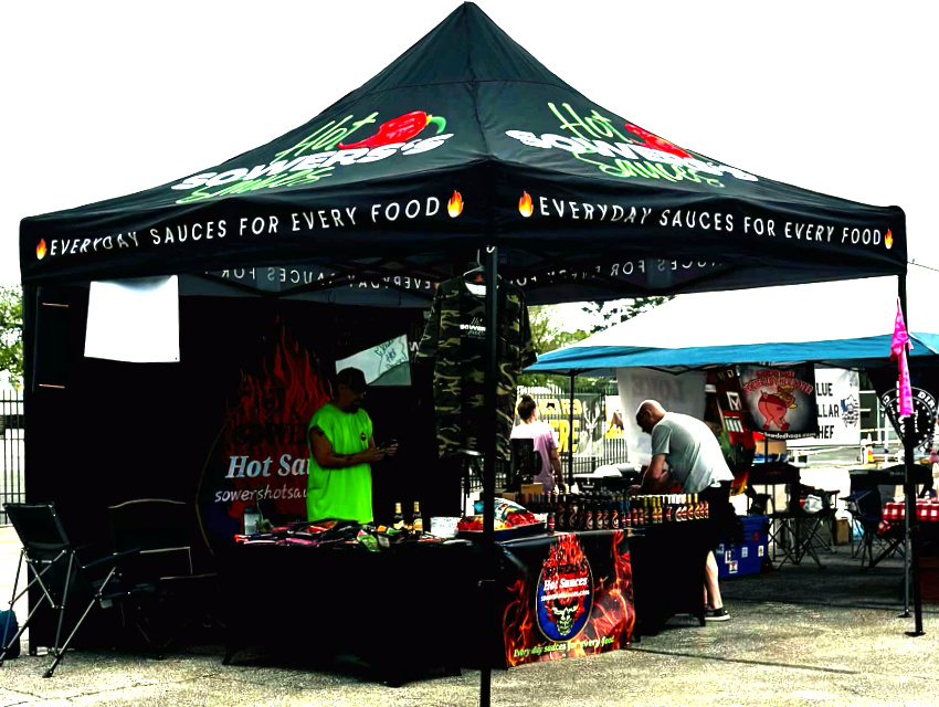 Side view of Sowers' Hot Sauce custom event tent